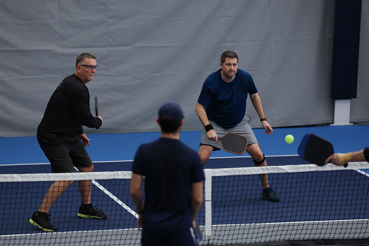 Men playing pickleball